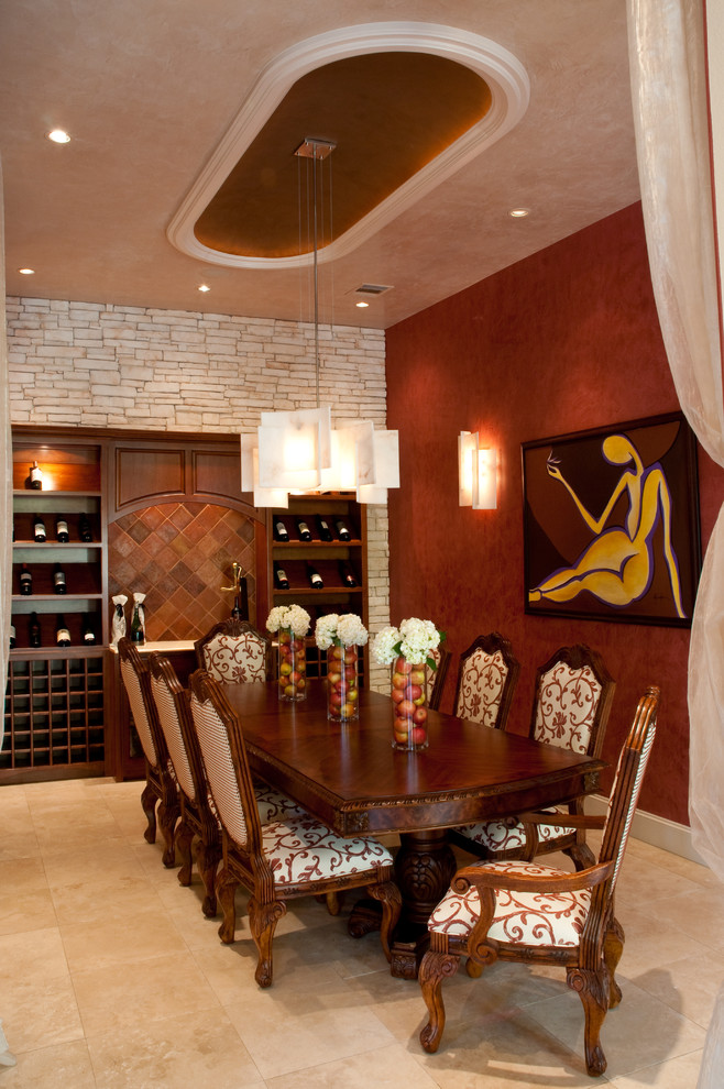 Large transitional dining room in Other with limestone floors, no fireplace, beige floor and red walls.