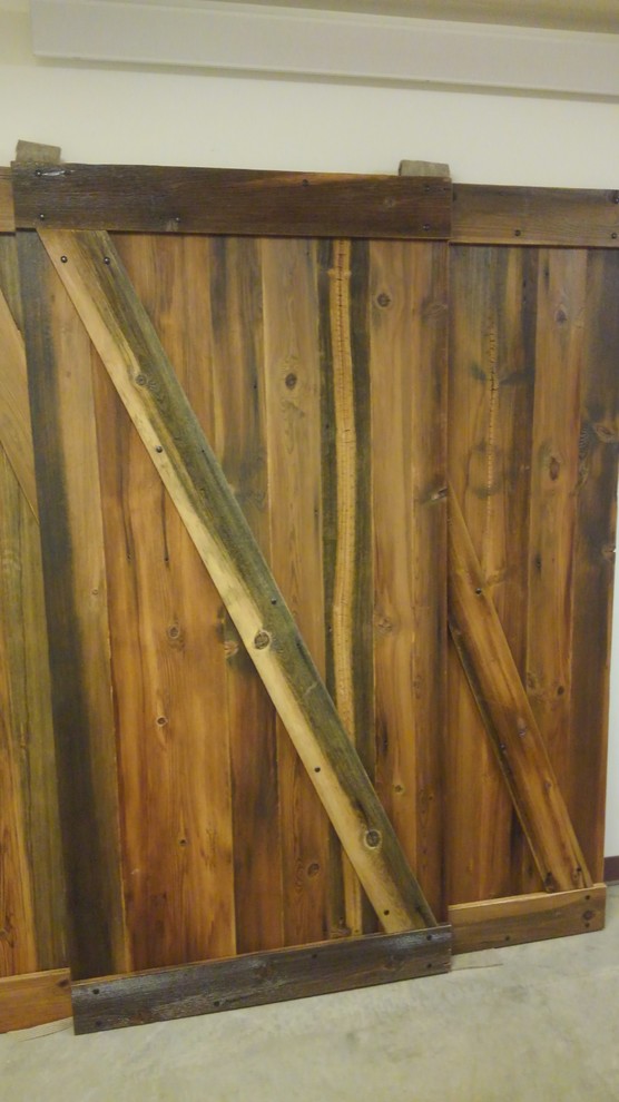 Small mountain style front door photo with a medium wood front door
