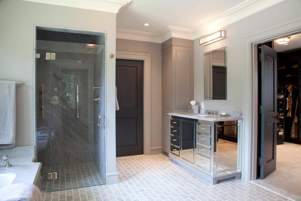 This is an example of an expansive arts and crafts master bathroom in Boston with an undermount sink, marble benchtops, an undermount tub, a curbless shower, gray tile, stone tile, grey walls and marble floors.