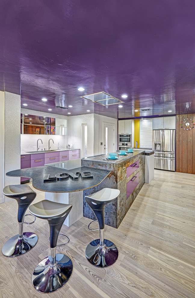 Inspiration for a large modern l-shaped separate kitchen in Sacramento with an undermount sink, flat-panel cabinets, purple cabinets, quartz benchtops, white splashback, porcelain splashback, stainless steel appliances, light hardwood floors and with island.