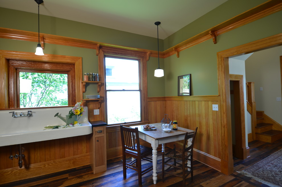 Mid-sized country separate kitchen in Portland with a farmhouse sink, shaker cabinets, light wood cabinets and medium hardwood floors.