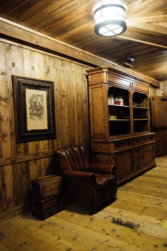 Inspiration for a rustic hallway remodel in Denver