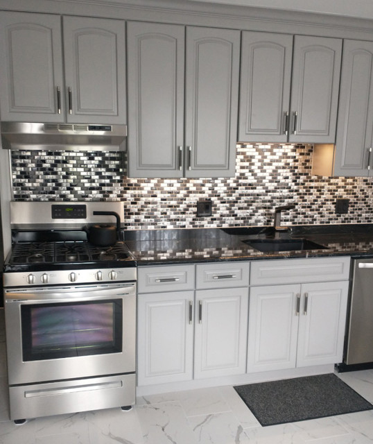 Eden Mosaic Tile Installations STAINLESS STEEL AND CRACKLED GLASS