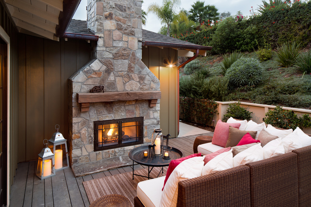 Country deck in San Diego with a fire feature and no cover.