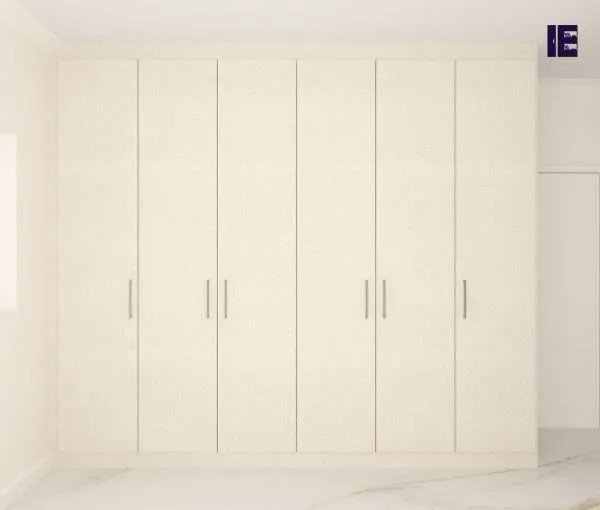 Design ideas for a large contemporary built-in wardrobe in London with flat-panel cabinets and beige cabinets.