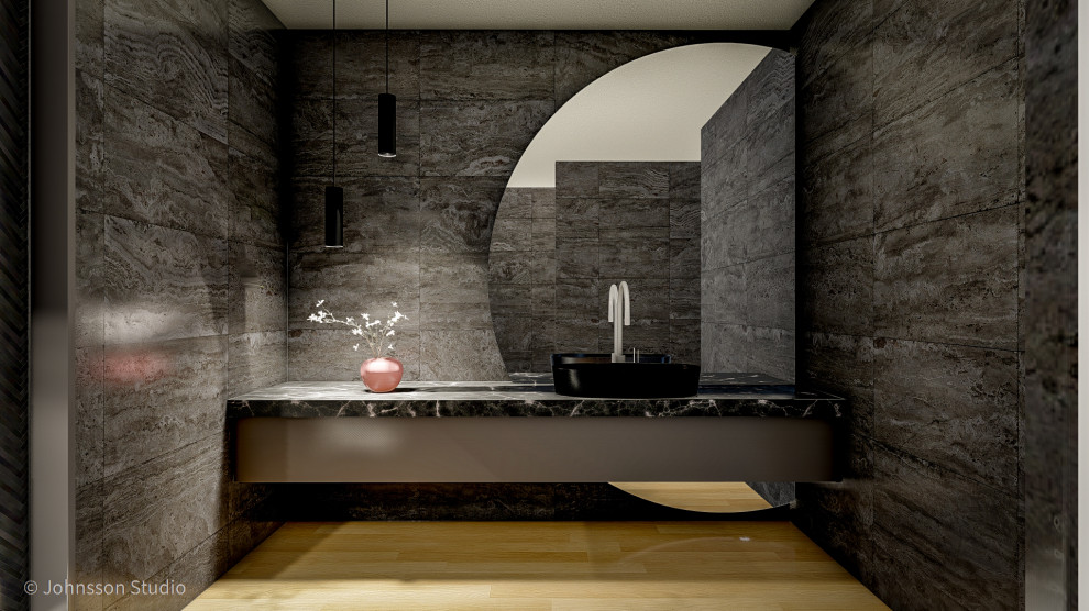 На фото: ванная комната среднего размера в современном стиле с черными фасадами, черной плиткой, керамогранитной плиткой, полом из плитки под дерево, мраморной столешницей, черной столешницей, тумбой под одну раковину и подвесной тумбой