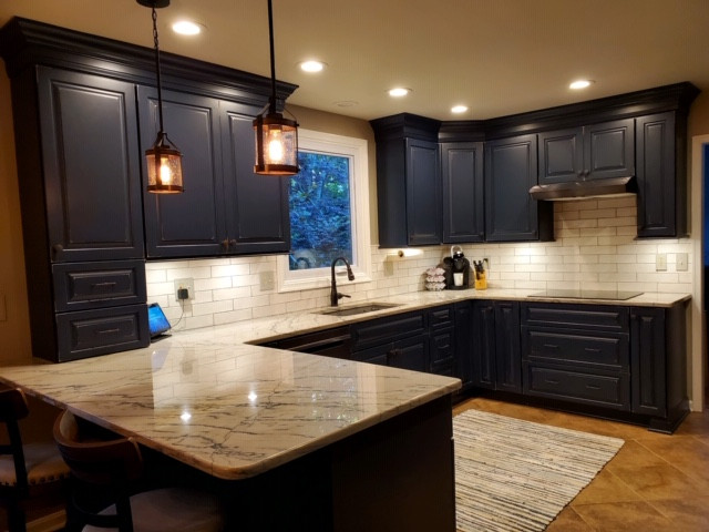 Dark Blue Cabinetry Makes for a Warm & Welcoming Kitchen