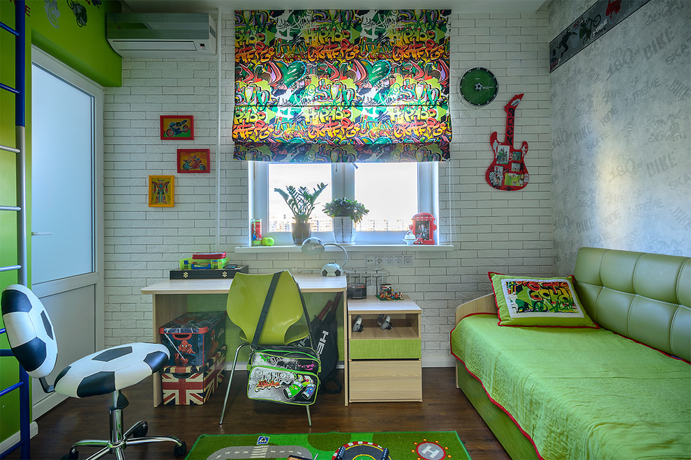 Photo of a contemporary kids' bedroom for kids 4-10 years old and boys in Moscow with dark hardwood floors.