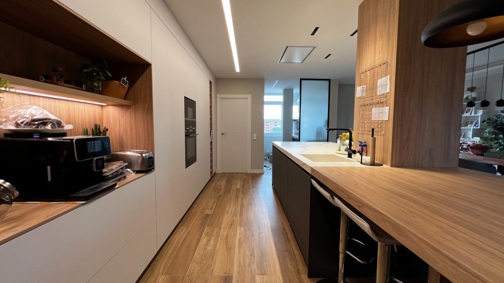 Cocina integrada a Salón en Igualada