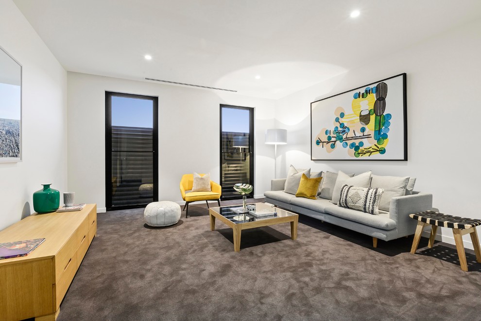 Design ideas for a mid-sized contemporary formal enclosed living room in Melbourne with white walls, carpet and grey floor.