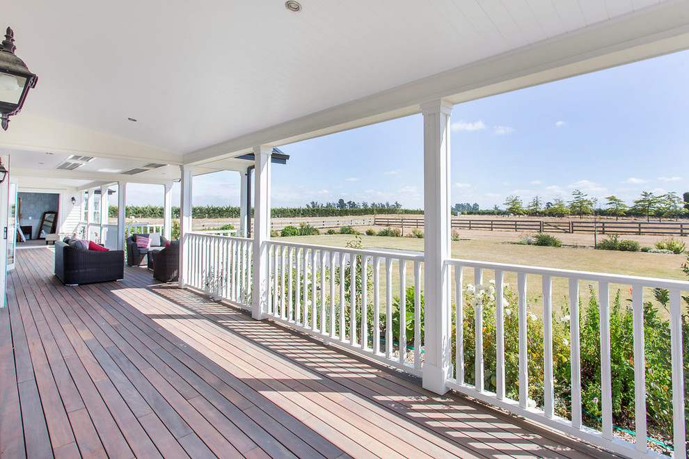 Photo of a Large country Backyard deck in Christchurch With a Roof Extension.