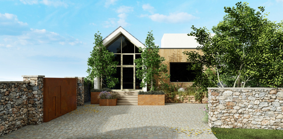 Идея дизайна: большой летний участок и сад на заднем дворе в современном стиле с подпорной стенкой, полуденной тенью и с каменным забором