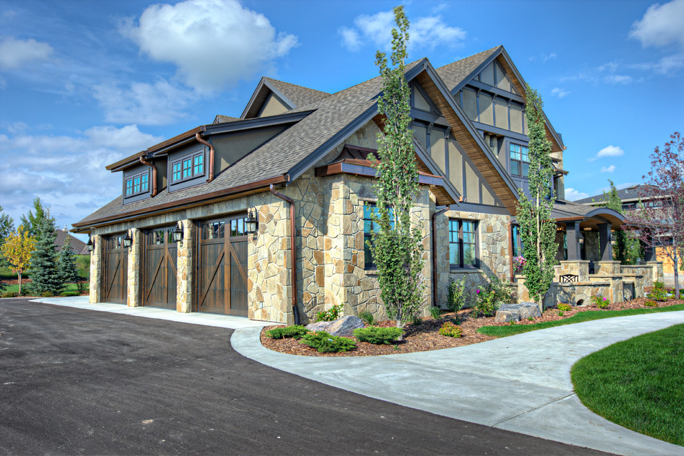 This is an example of a traditional exterior in Calgary with mixed siding.
