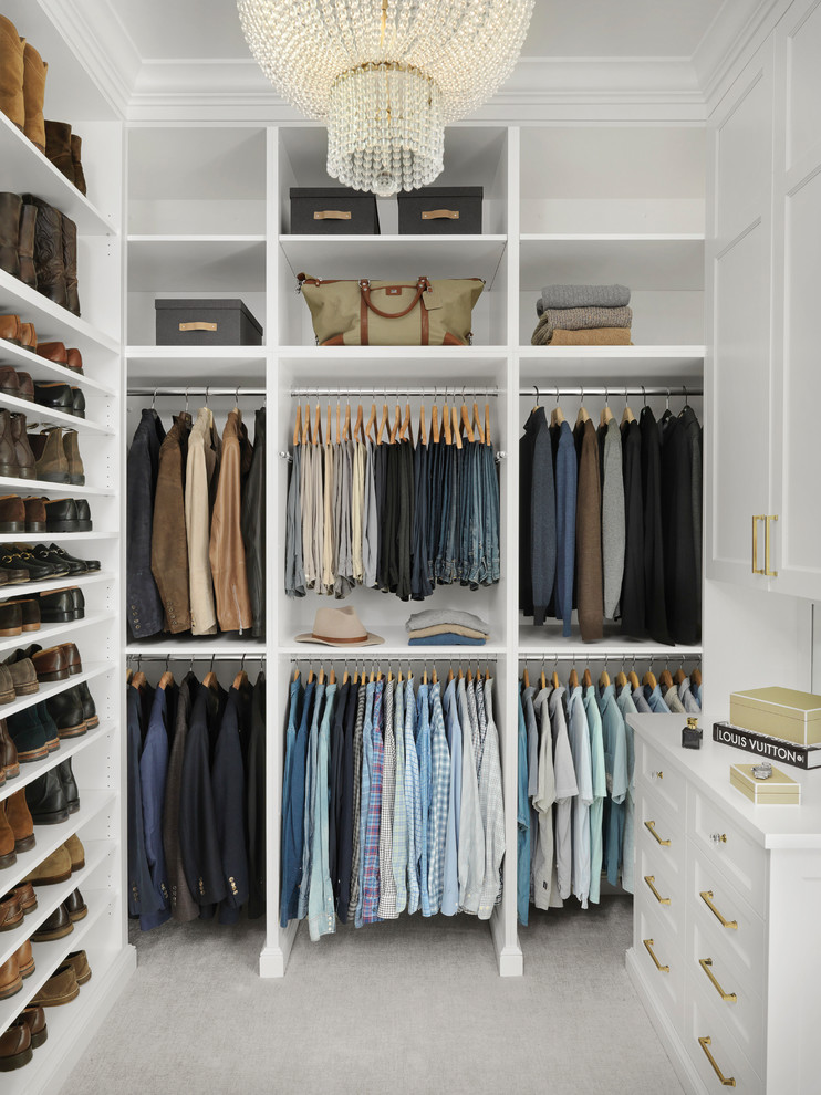 Design ideas for a traditional men's walk-in wardrobe in St Louis with open cabinets, white cabinets, carpet and grey floor.