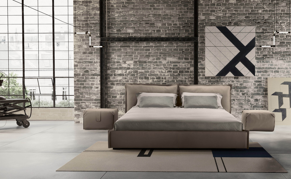 Large contemporary loft-style bedroom in Philadelphia with grey walls, concrete floors, no fireplace and grey floor.