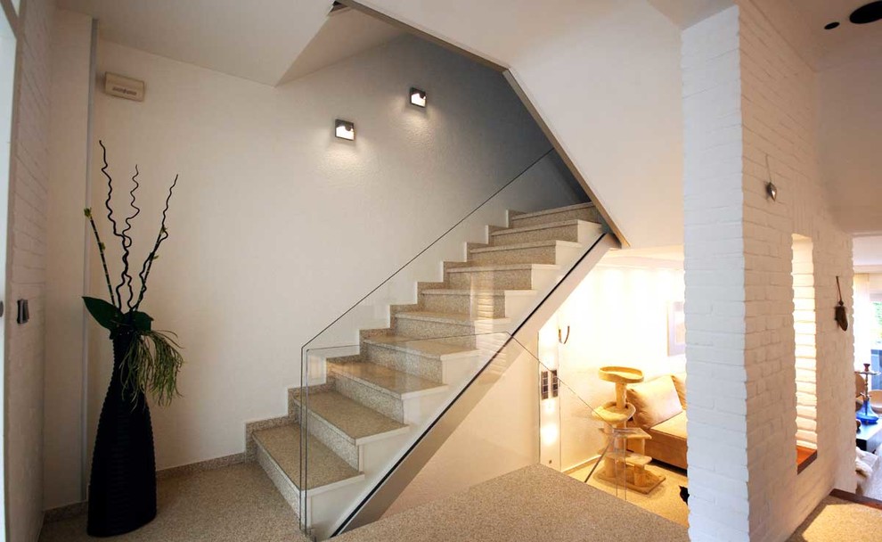 This is an example of a large contemporary staircase in Dusseldorf.