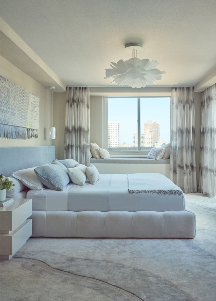Inspiration for a contemporary grey and cream bedroom in New York.