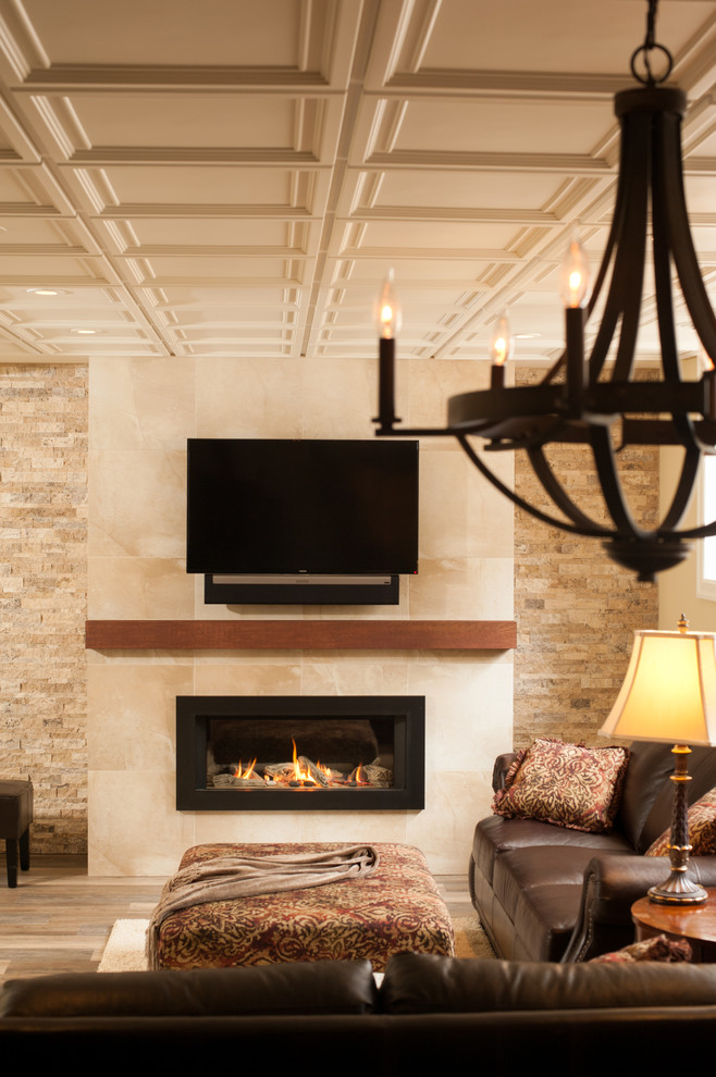 Inspiration for a mid-sized transitional medium tone wood floor family room remodel in Boston with beige walls, a ribbon fireplace, a plaster fireplace and a wall-mounted tv