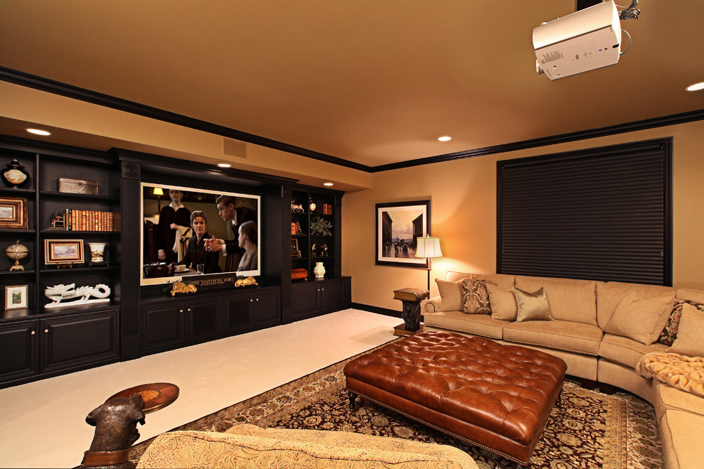 Design ideas for a large traditional home theatre in Detroit with beige walls, carpet, a projector screen and beige floor.