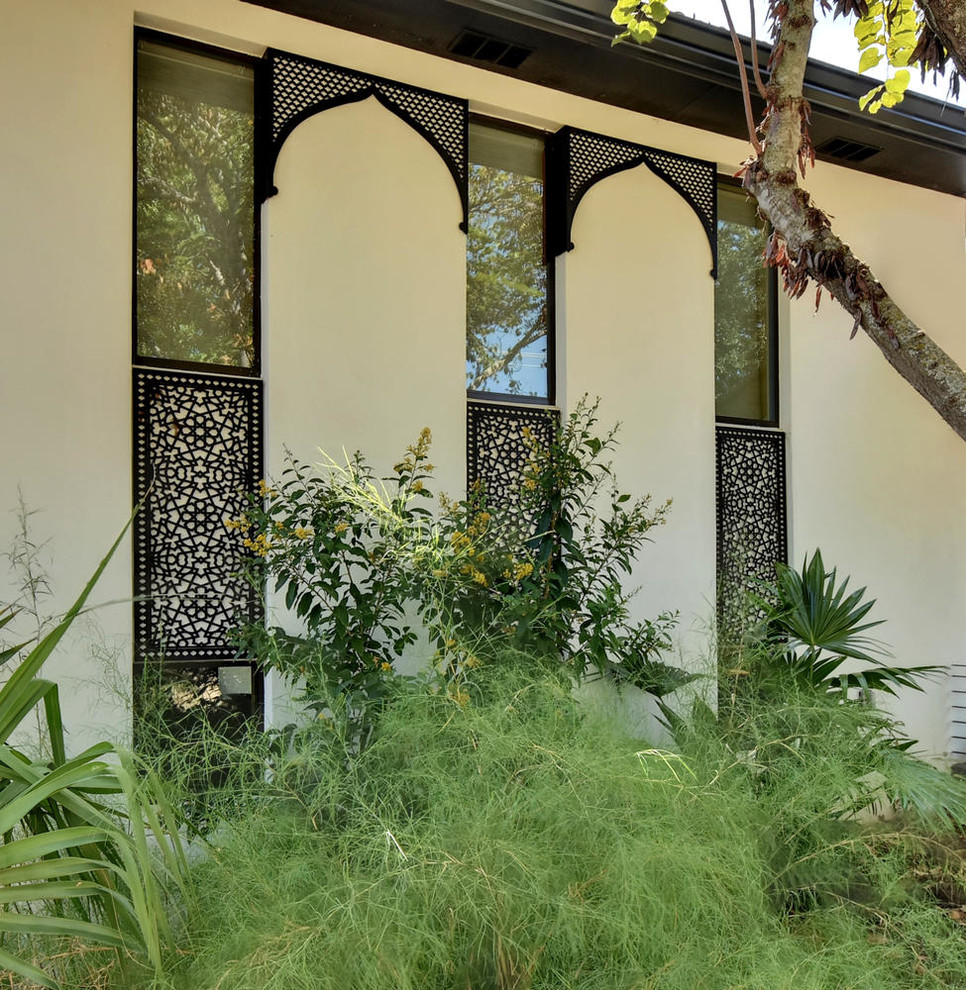 Inspiration for a transitional exterior home remodel in Austin