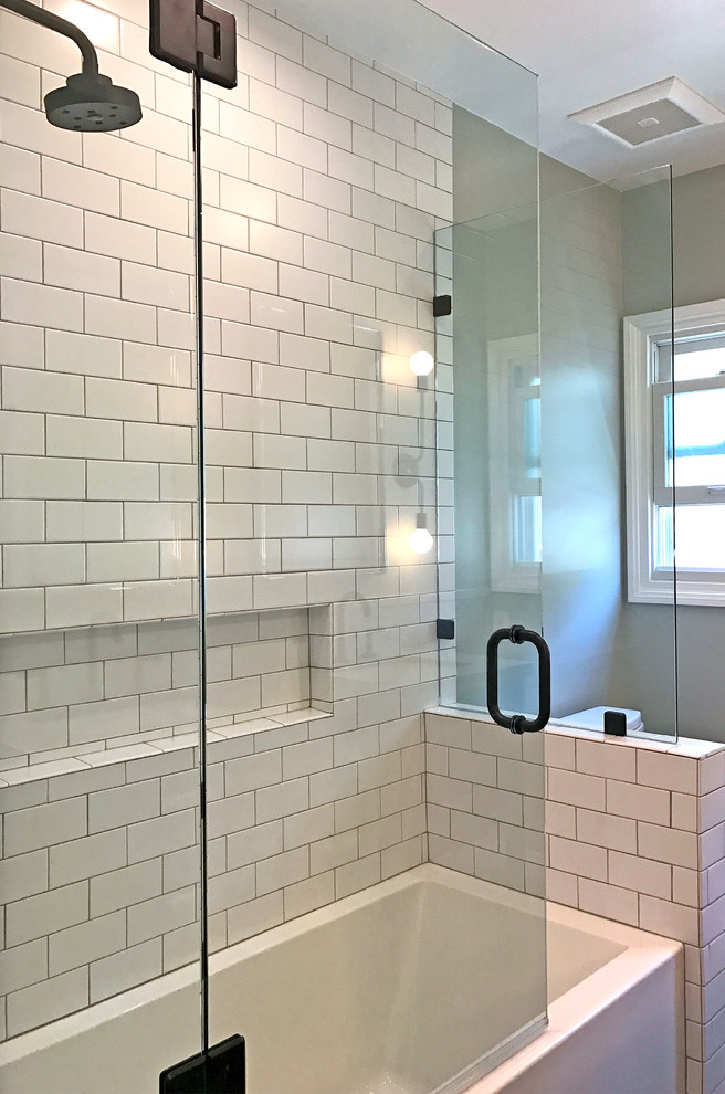 Inspiration for a small industrial bathroom in Los Angeles with flat-panel cabinets, brown cabinets, a drop-in tub, an alcove shower, a bidet, gray tile, marble, green walls, ceramic floors, an undermount sink, concrete benchtops, grey floor and an open shower.