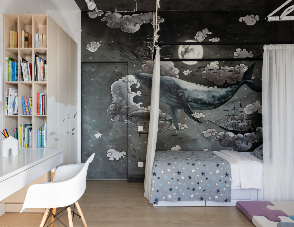 Esempio di una cameretta per bambini da 4 a 10 anni scandinava di medie dimensioni con pareti bianche, pavimento in vinile e pavimento beige