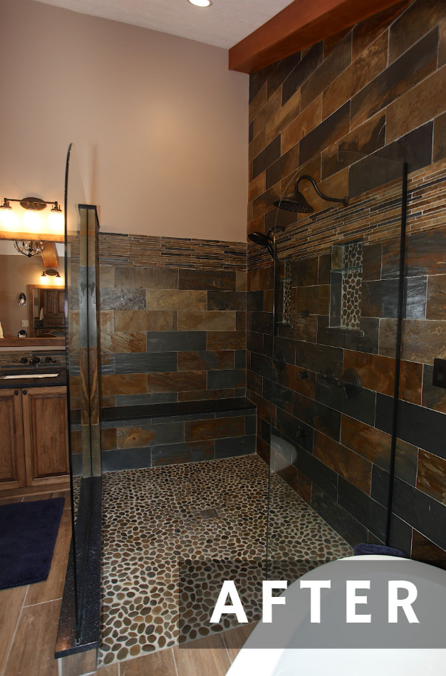 Large mountain style master slate tile brown floor freestanding bathtub photo in Indianapolis with brown cabinets, beige walls and an undermount sink