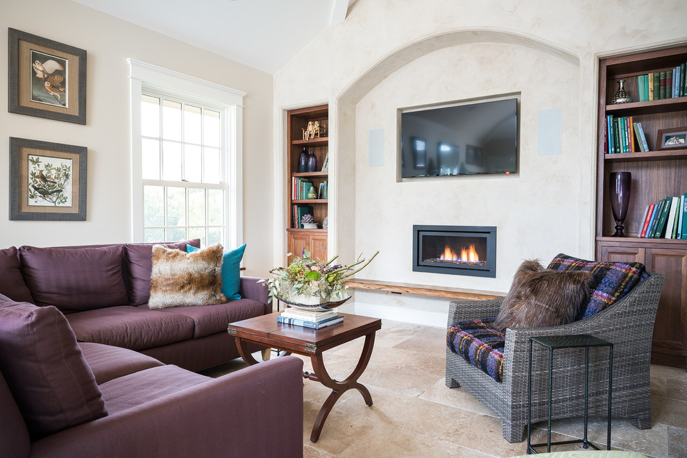 Design ideas for a mid-sized transitional open concept family room in Philadelphia with beige walls, limestone floors, a ribbon fireplace, a plaster fireplace surround and a wall-mounted tv.