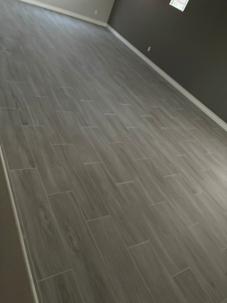 Tile plank install / laundry room cabinetry