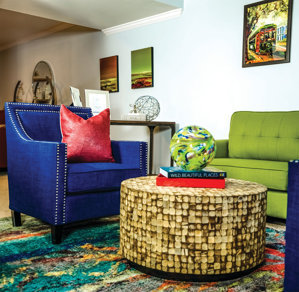 Design ideas for an expansive eclectic look-out basement with blue walls, carpet and beige floor.