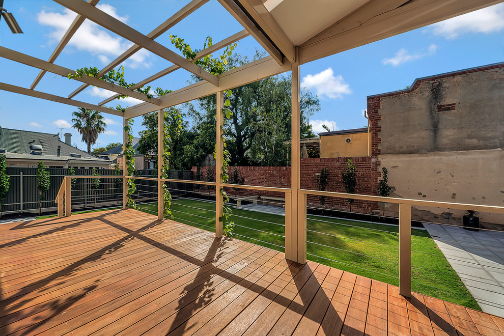 Inspiration for a mid-sized contemporary backyard deck in Adelaide with a pergola.