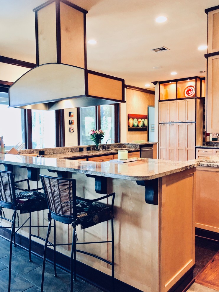 Example of a transitional home design design in Jackson