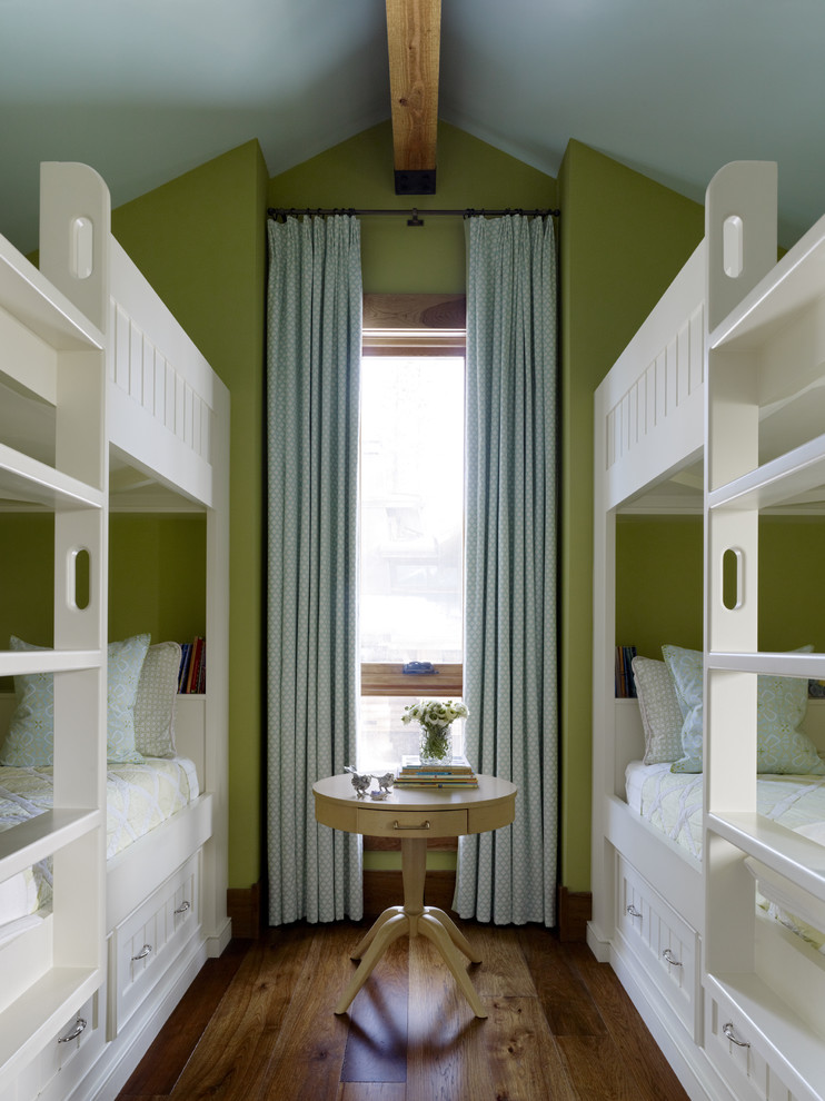 This is an example of a contemporary guest bedroom in San Francisco with green walls and medium hardwood floors.