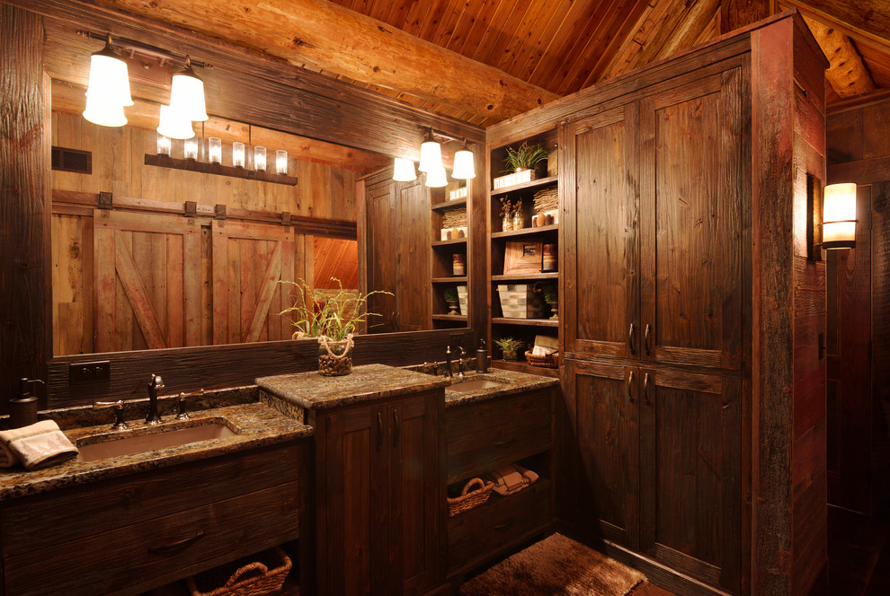 Inspiration for a country bathroom in Minneapolis with an undermount sink and dark wood cabinets.