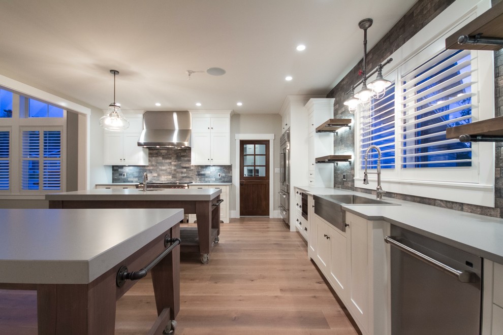 Example of a transitional kitchen design in Vancouver
