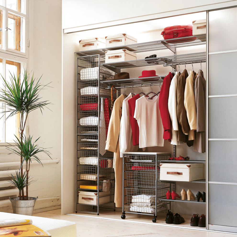 Design ideas for a medium sized scandinavian gender neutral walk-in wardrobe in Other with open cabinets, grey cabinets, light hardwood flooring, beige floors and a wallpapered ceiling.