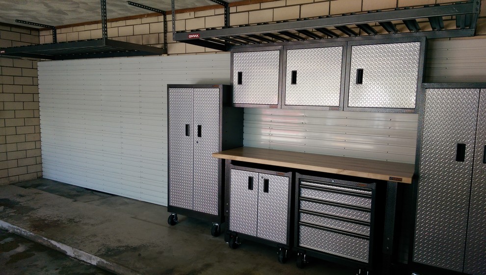 Inspiration for a mid-sized transitional garage workshop remodel in Denver