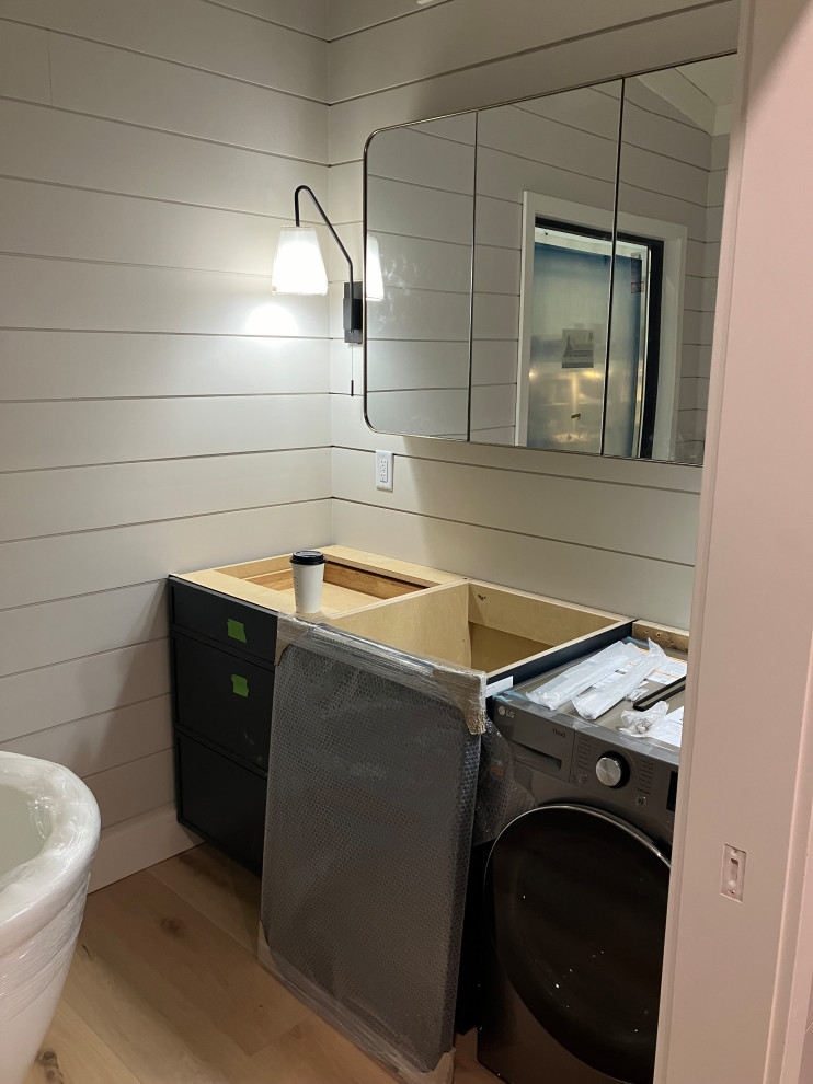 Bathroom with Soaking Tub, Vanity and Washer/Dryer Combo