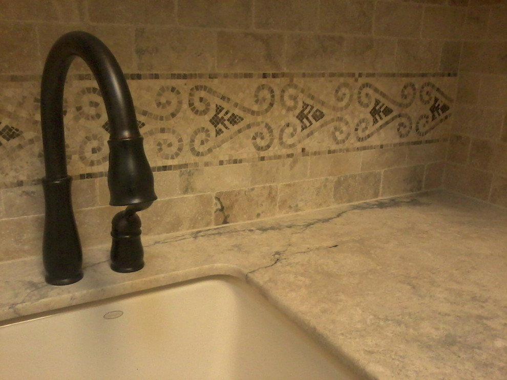 Dedicated laundry room - transitional travertine floor dedicated laundry room idea with an undermount sink