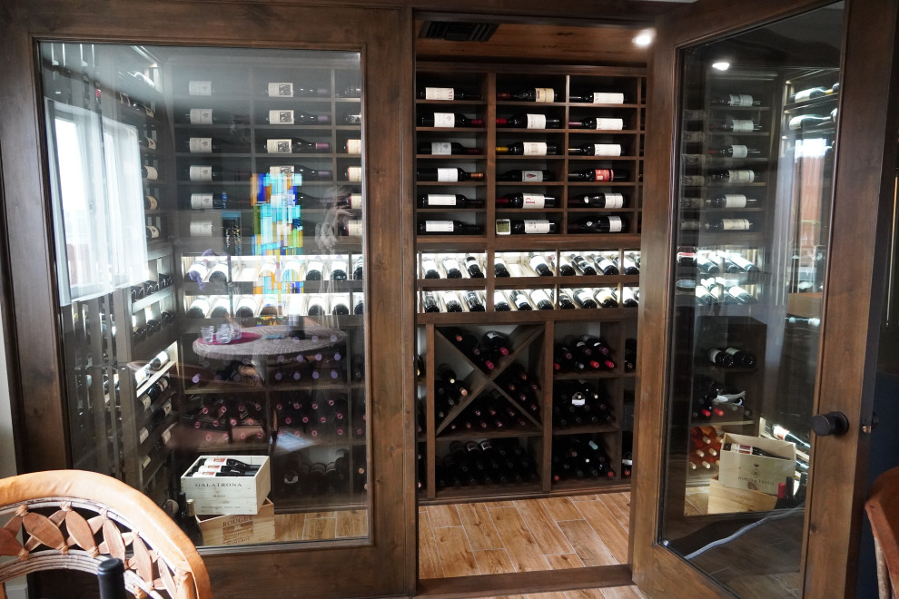 This is an example of a contemporary wine cellar in Orange County.