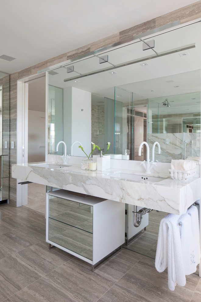 Large modern master bathroom in Boston with flat-panel cabinets, an open shower, beige tile, gray tile, multi-coloured tile, white tile, stone slab, grey walls, linoleum floors, an undermount sink and marble benchtops.