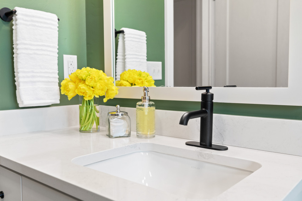 Example of a small white tile and ceramic tile slate floor, gray floor and single-sink alcove bathtub design with white cabinets, a bidet, green walls, an undermount sink, quartz countertops, white countertops and a built-in vanity