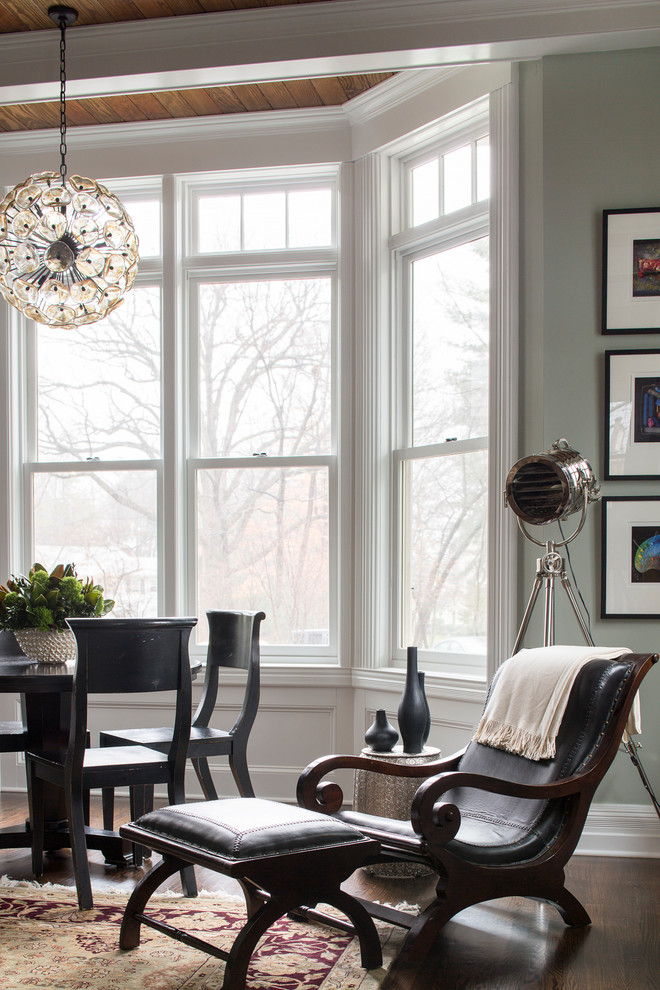 Design ideas for a large traditional open concept family room in New York with dark hardwood floors and grey walls.