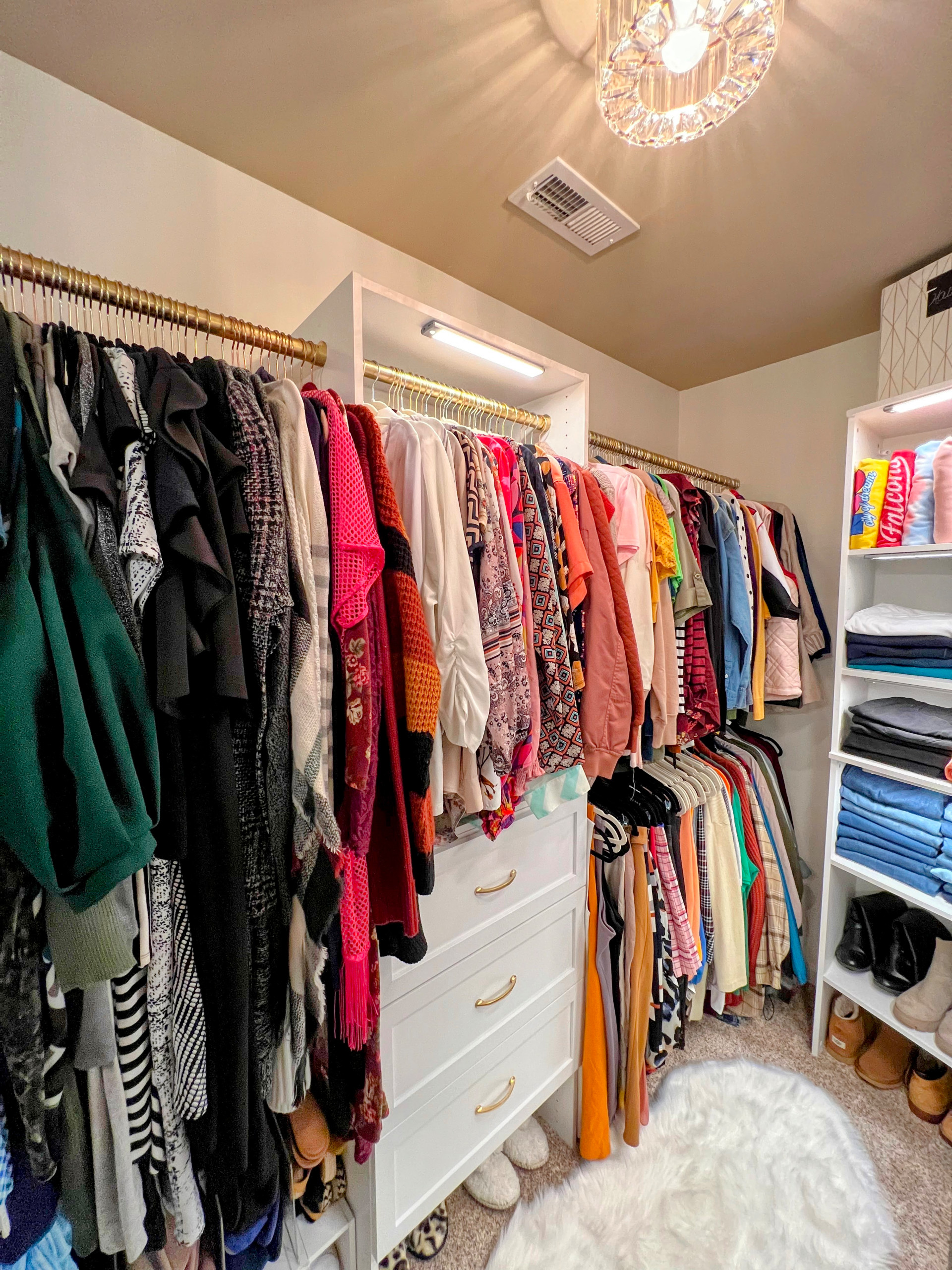 An image of a well-organized custom closet completed by Calming Home by Venus
