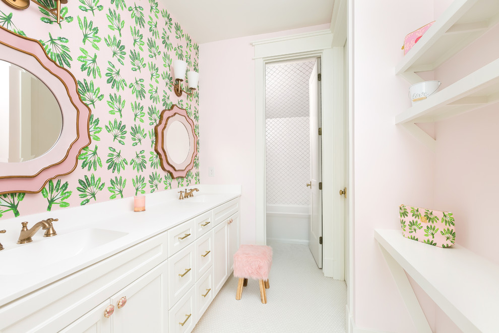 Large transitional kids' white tile and ceramic tile white floor and mosaic tile floor alcove bathtub photo in Charleston with pink walls, white cabinets, white countertops, recessed-panel cabinets, an integrated sink and quartz countertops