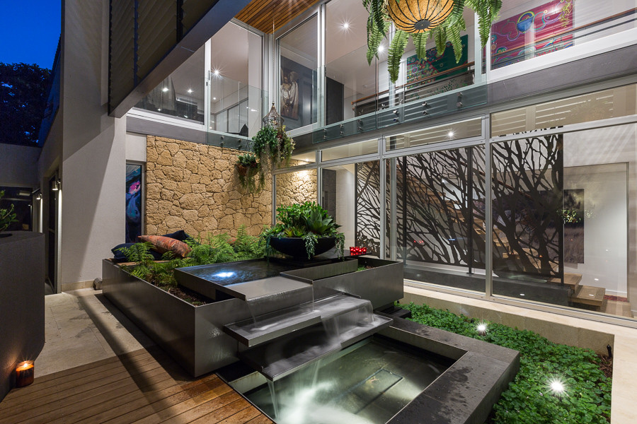 Design ideas for a small asian side yard garden in Perth with a water feature and decking.