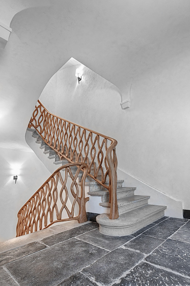Eclectic concrete curved wood railing staircase in Berlin with concrete risers.