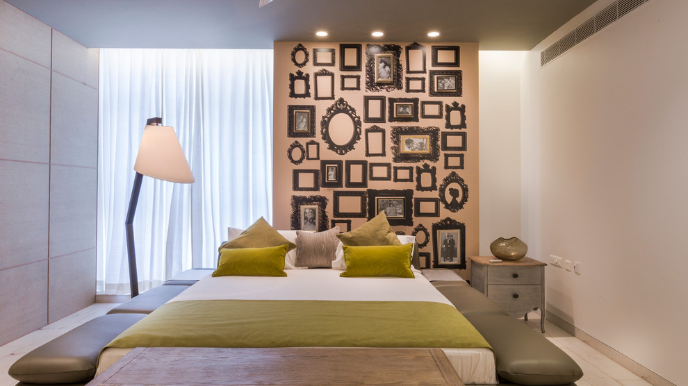 Large contemporary bedroom in Hyderabad with beige walls.