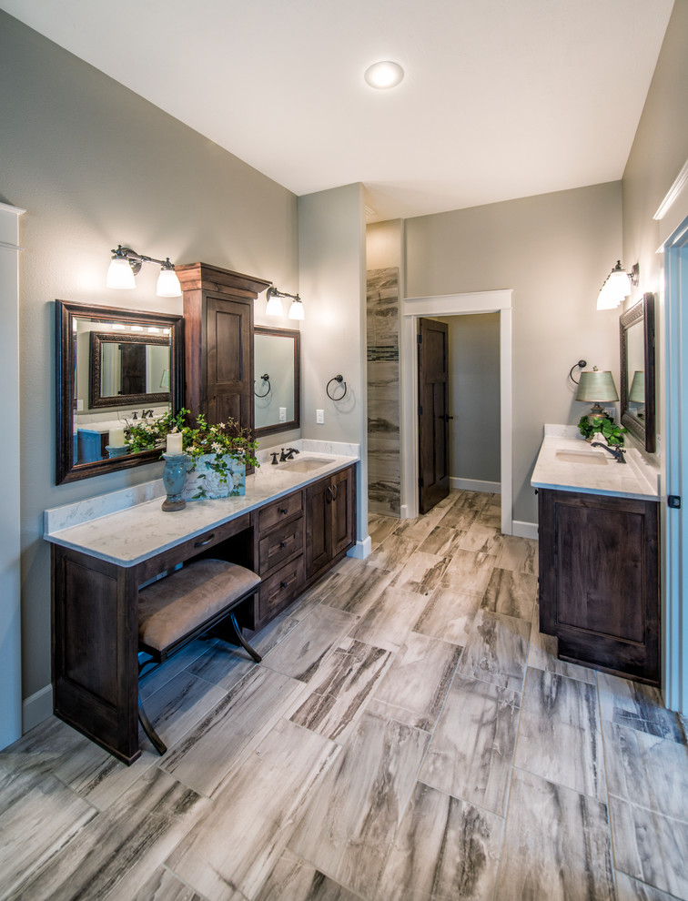 Inspiration for a large rustic master black and white tile, green tile and matchstick tile porcelain tile freestanding bathtub remodel with beaded inset cabinets, dark wood cabinets, beige walls, an undermount sink and quartz countertops