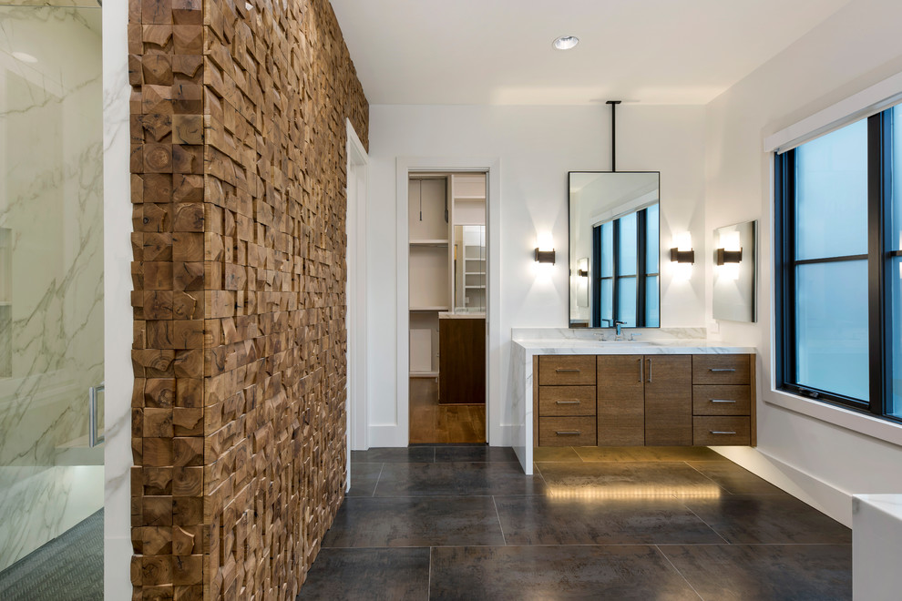 Design ideas for a mid-sized modern master bathroom in Dallas with flat-panel cabinets, brown cabinets, an alcove shower, brown tile, white walls, porcelain floors, an undermount sink, marble benchtops, brown floor, a hinged shower door and white benchtops.